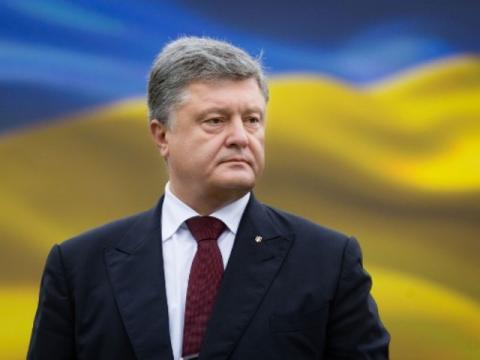 Порошенко заявил, что флаг Украины будет поднят над всеми территориями Донбасса
